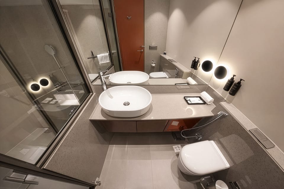 Shower, free toiletries, hair dryer, slippers