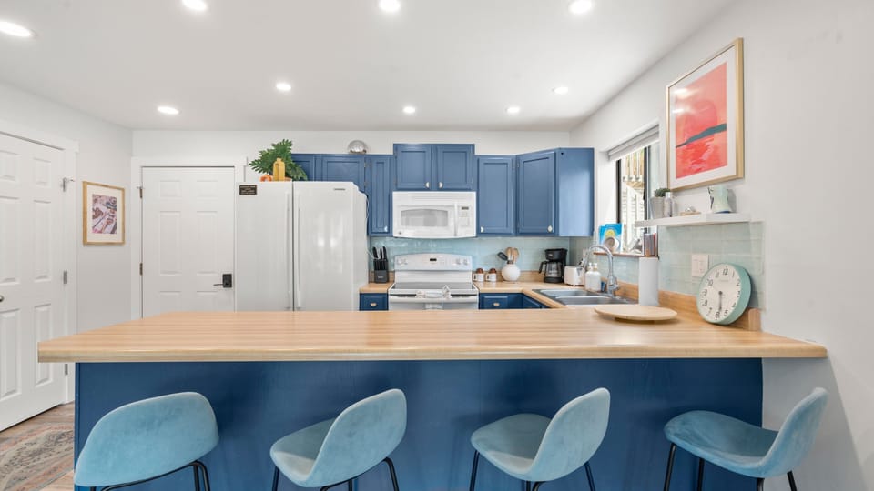 The open kitchen is well equipped for an unforgettable getaway​