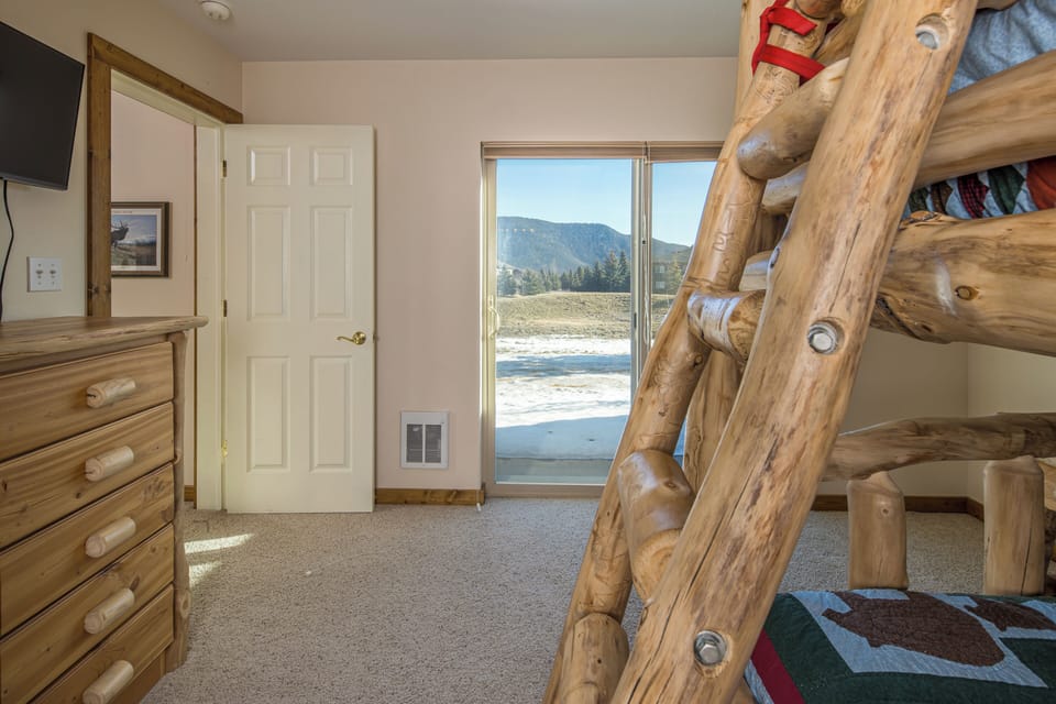 Access to the patio from the bunk room | Main Level