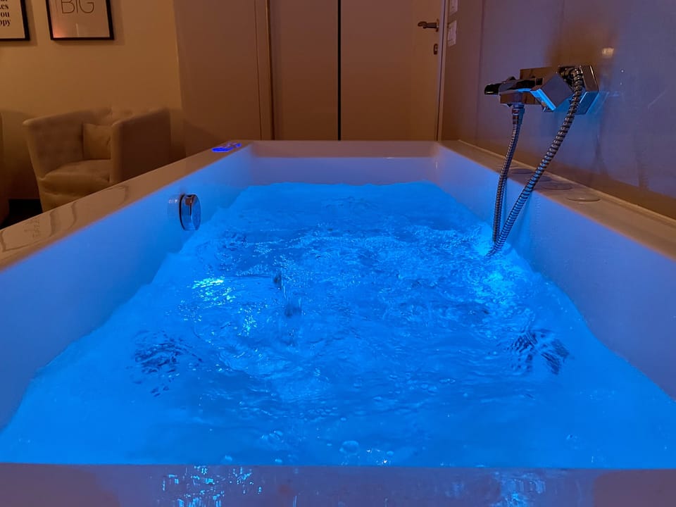 Luxury Suite, Jetted Tub | Premium bedding, minibar, in-room safe, desk