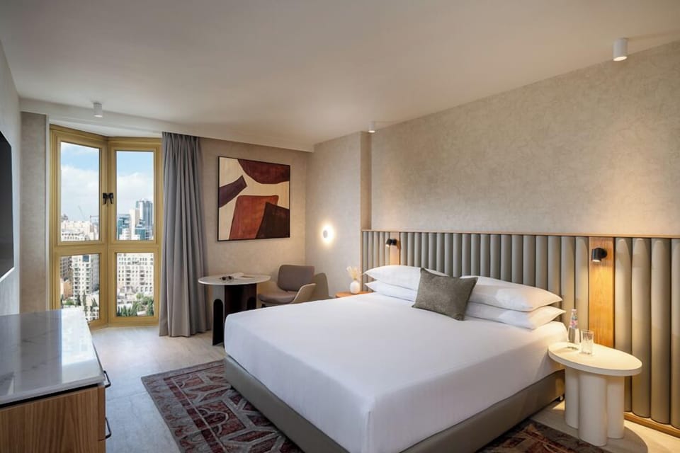 Deluxe New City Renovated | Hypo-allergenic bedding, in-room safe, desk, blackout drapes