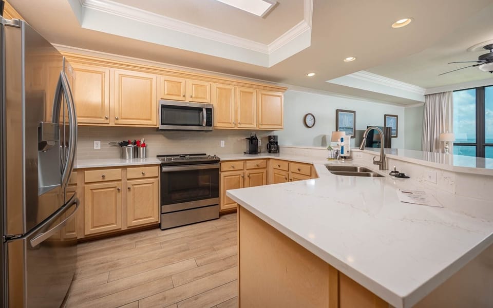 Condo, 2 Bedrooms | Private kitchen | Coffee/tea maker, fridge, oven