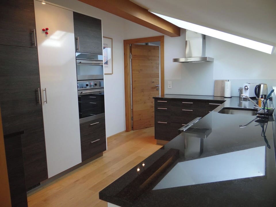 Countertop, Kitchen, Cabinetry, Furniture, Flooring, Interior Design, Wood, Kitchen Appliance, Floor, Home