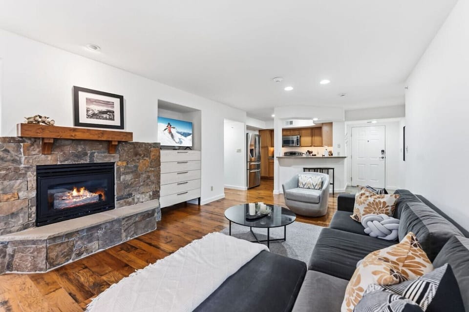 Cozy living room with smart TV and gas fireplace