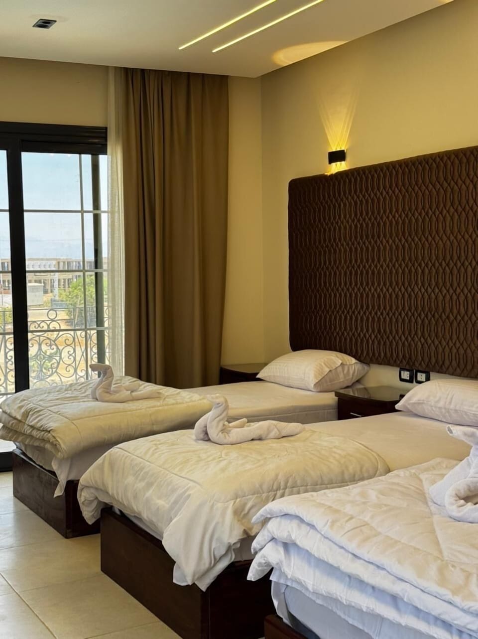 Premium Quadruple Room, Pool View | Desk, laptop workspace