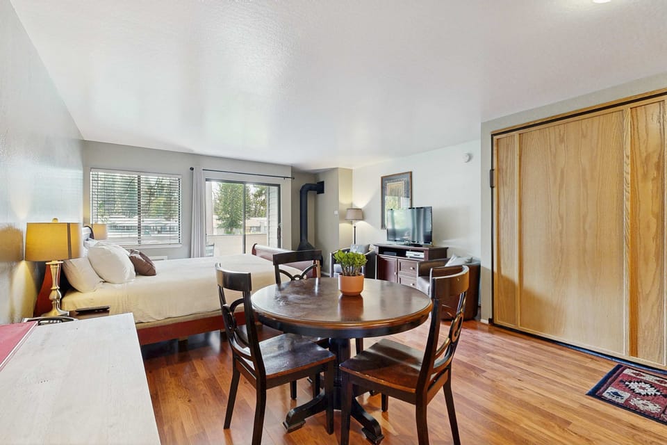 Murphy bed pulls down from the wall in this studio.