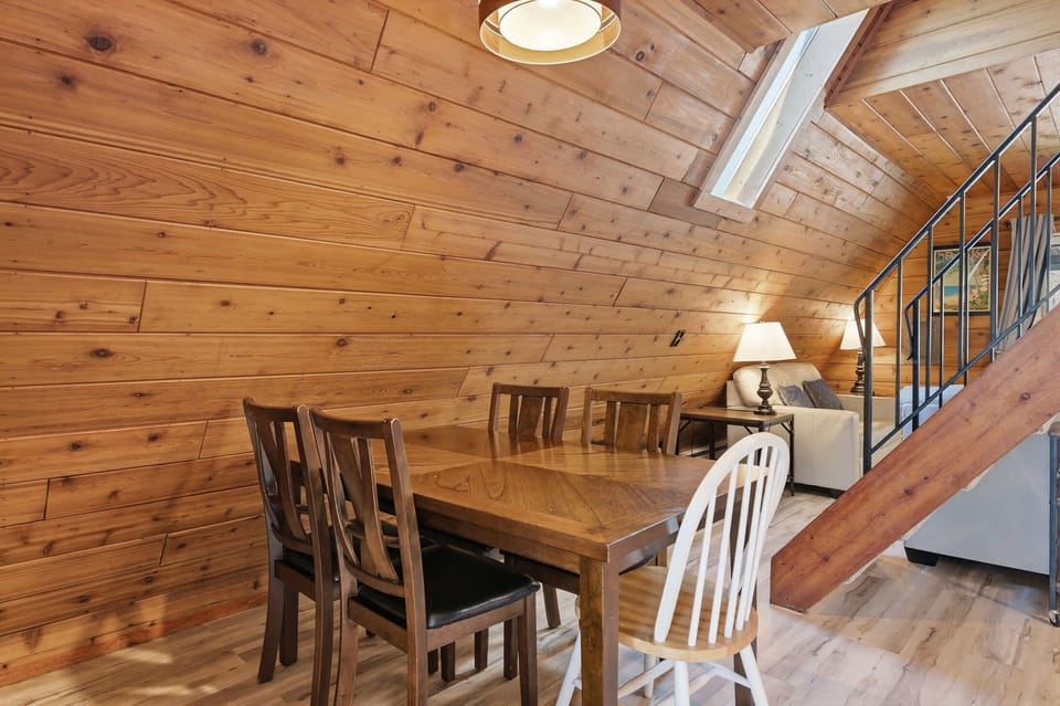 Seats for everyone, surrounded by warm wood.