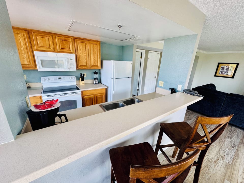 Luxury Condo, Balcony, Partial Ocean View | Private kitchen | Full-size fridge, microwave, oven, stovetop