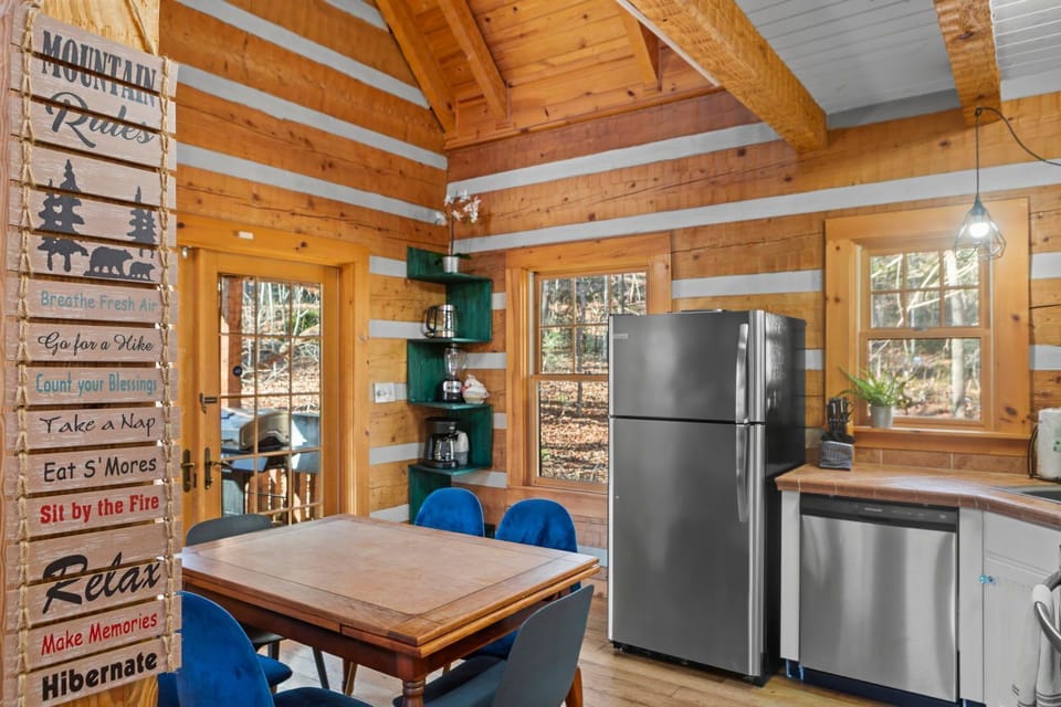 Gather around the rustic table in a warm, inviting space filled with natural light.