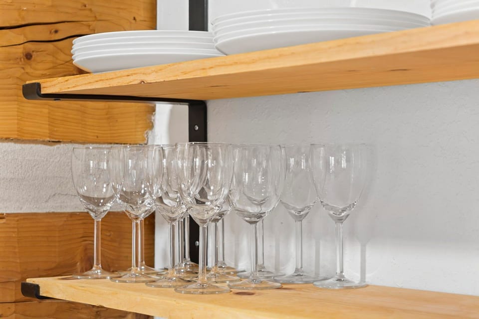 Elegant glassware awaits festive toasts and cozy dinners.