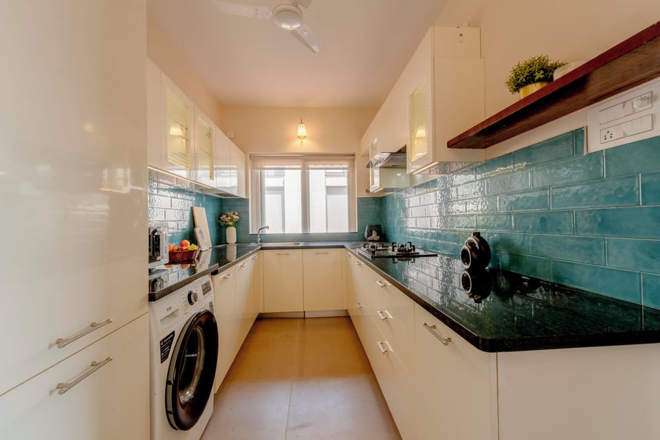Apartment, 2 Bedrooms, River View | Private kitchen | Electric kettle, dining tables