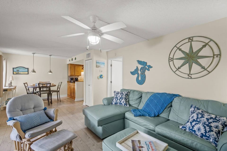 Seamless flow between living, dining, and kitchen areas for easy living.