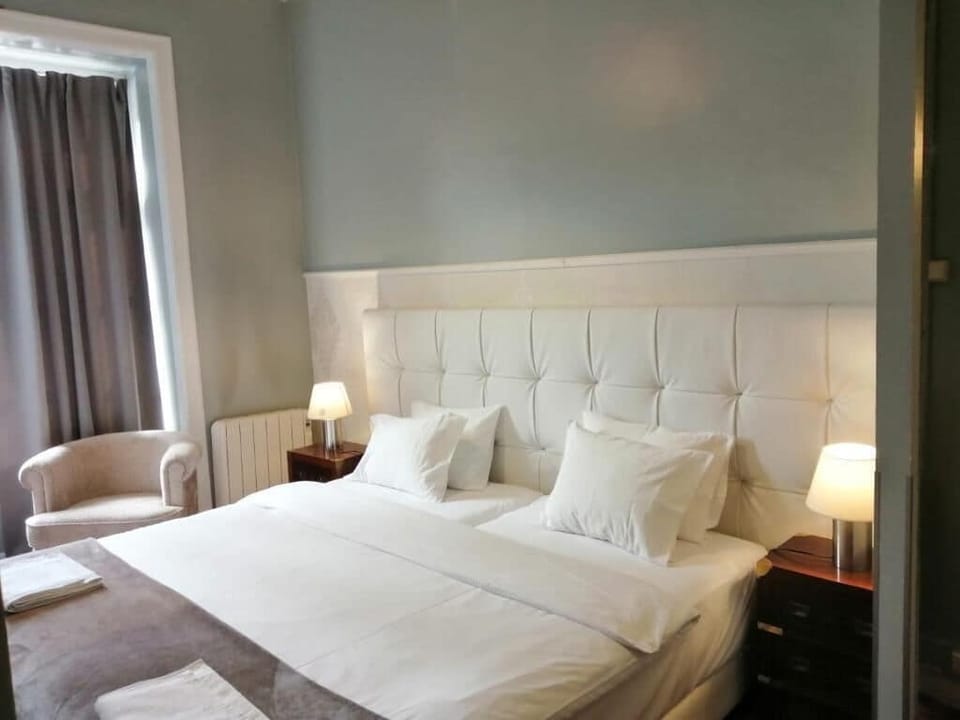 Family Triple Room, City View | Blackout drapes, iron/ironing board (on request), WiFi (free)