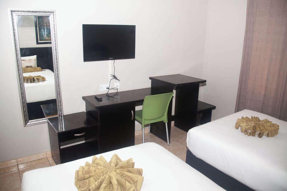 Desk, laptop workspace, iron/ironing board (on request), WiFi (free)