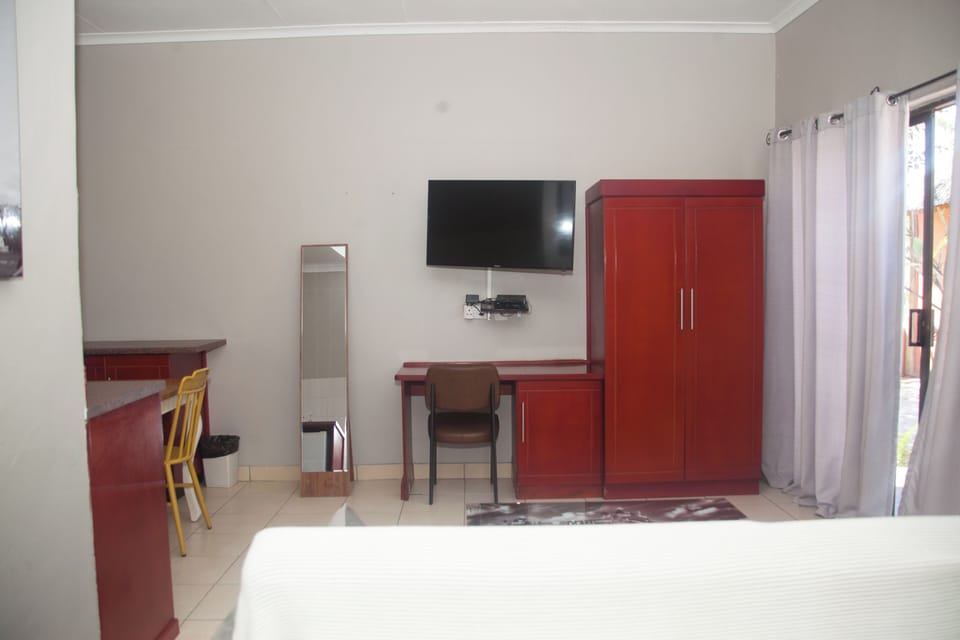 Desk, laptop workspace, iron/ironing board (on request), WiFi (free)