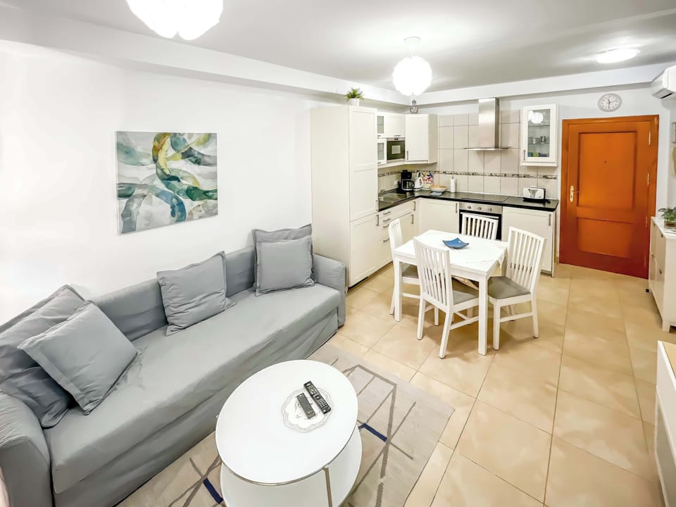 Open plan living room with sofa bed