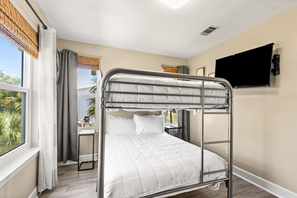 Main floor guest bedroom 2 with full-over-full bunk bed