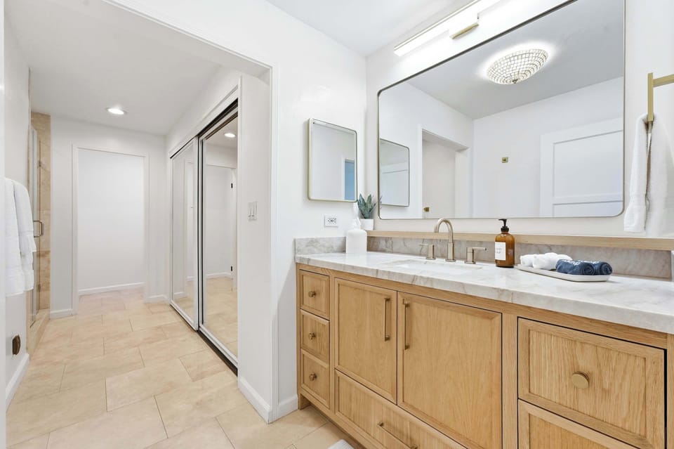 The master bath offers a single vanity sink and shower.