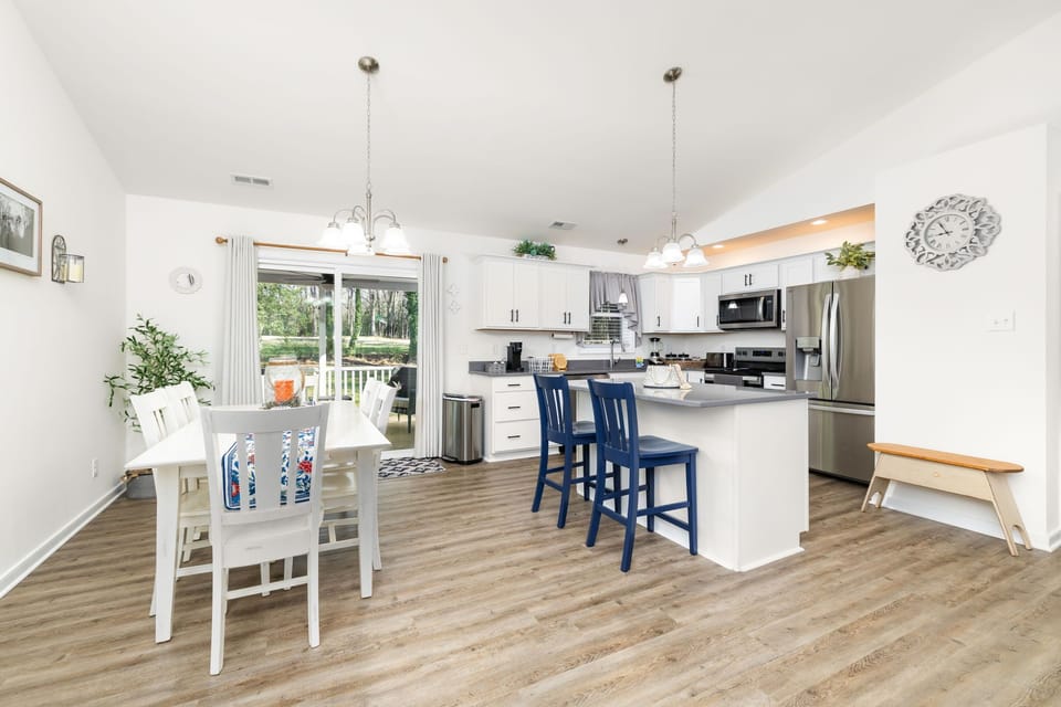 Island with barstools for casual dining and conversation.