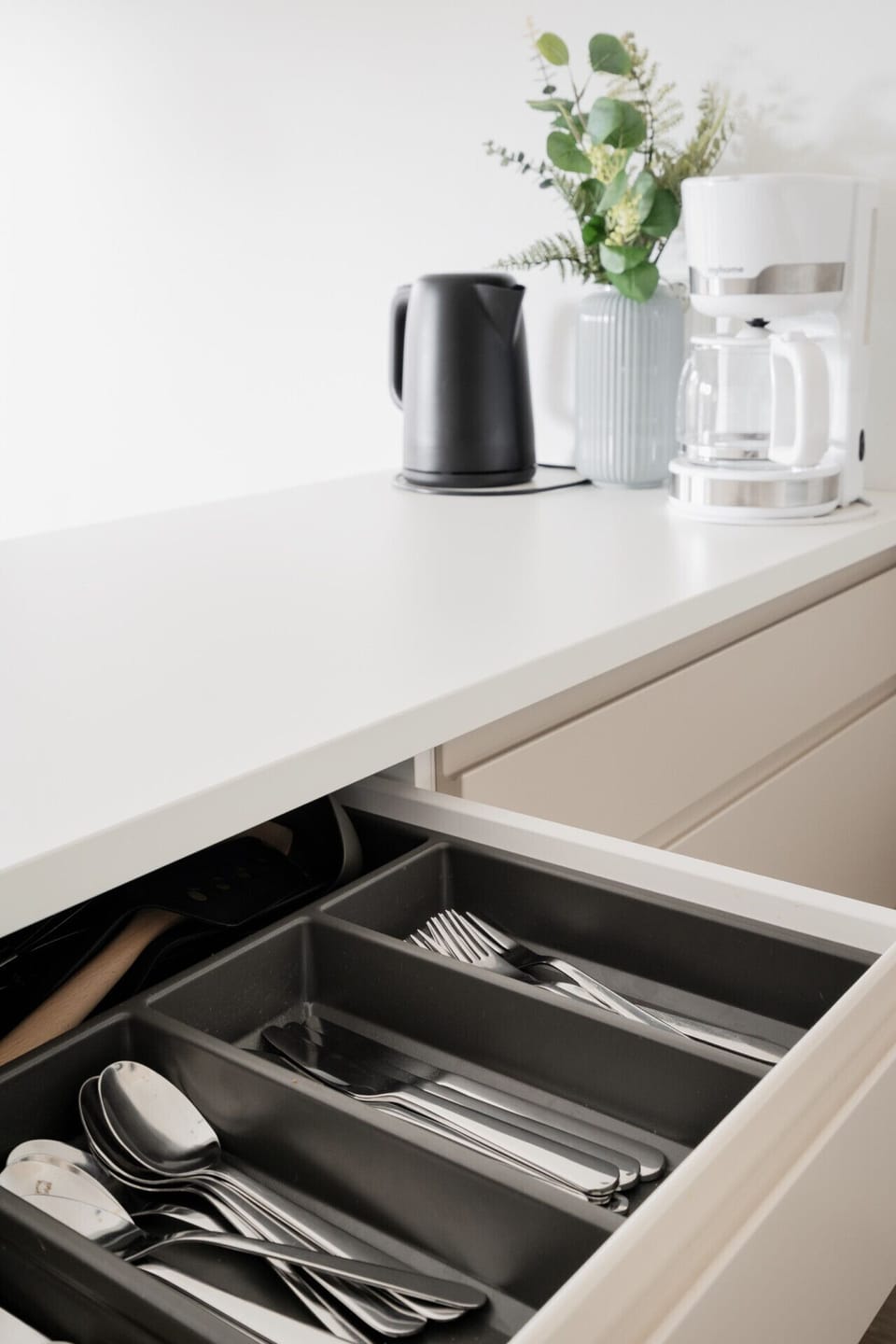 Ample cabinet space is available for your groceries, helping you keep the space tidy during longer `home away from home` stays.