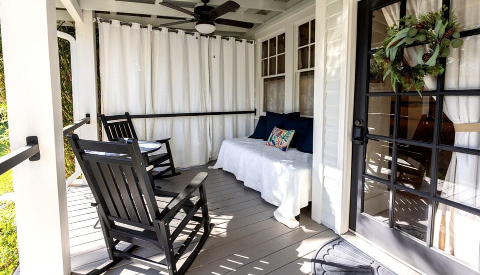 Nothing says Southern Charm like a classic sleeping porch.