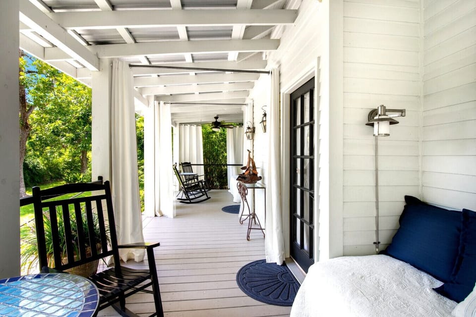 The Monroe Suite has its own private entrance from a large porch that overlooks the property`s gardens.