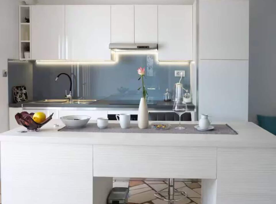 Apartment (Two Bedroom Apartment with Sea View a) | Private kitchen | Fridge