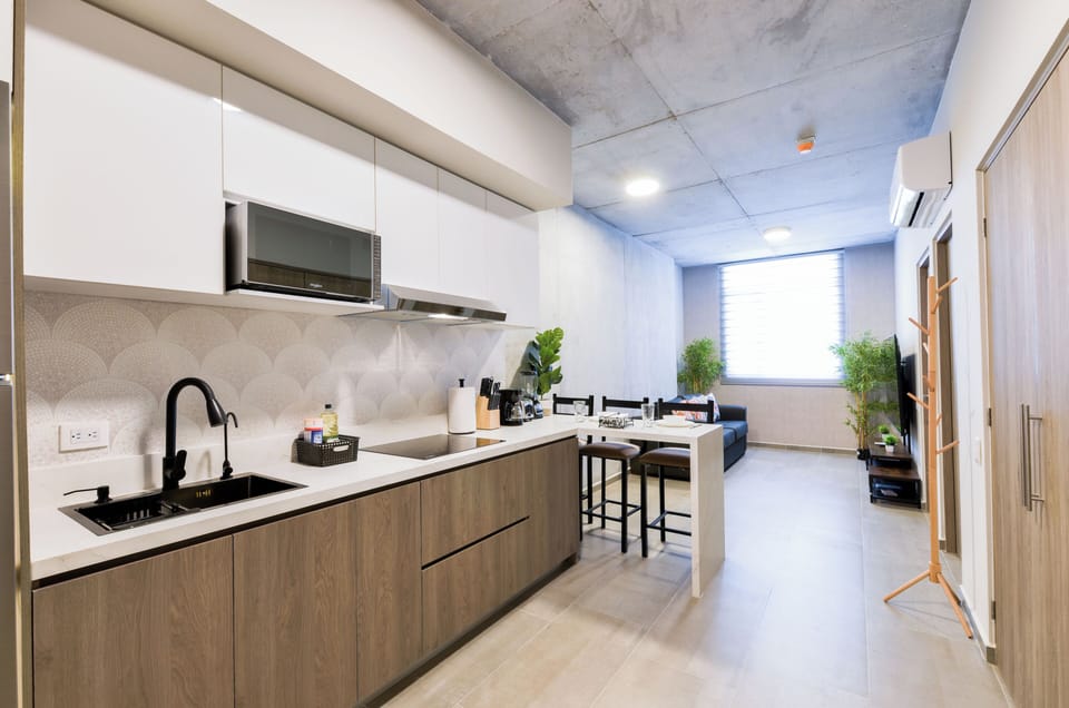 Suite, City View | Private kitchen | Full-size fridge, microwave, stovetop, blender