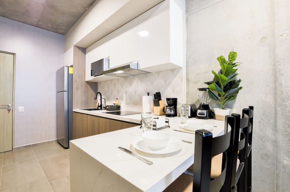 Suite, City View | Private kitchen | Full-size fridge, microwave, stovetop, blender