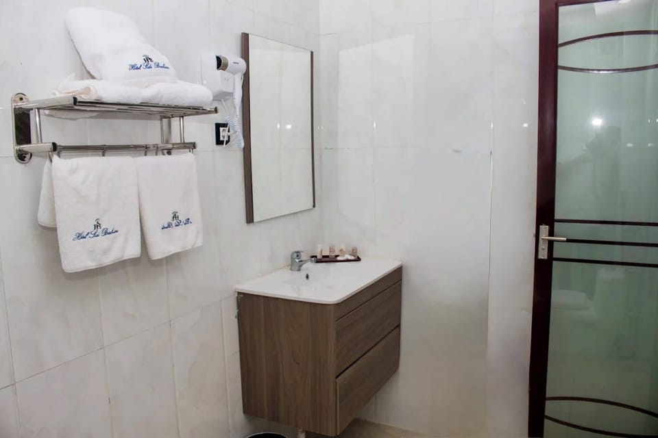 Double or Twin Room | Bathroom | Shower, free toiletries, towels, soap