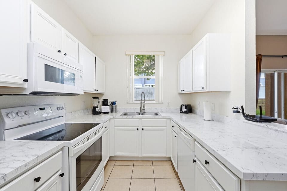 A clean, modern kitchen ready for easy vacation meals.