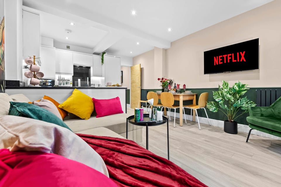Living room with open plan kitchen and dining area