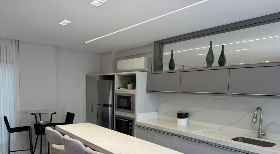 Deluxe Apartment, Pool Access, Beach View | Private kitchen | Fridge, microwave, cookware/dishes/utensils