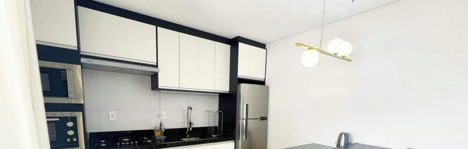 Deluxe Apartment, Pool Access, Beach View | Private kitchen | Fridge, microwave, cookware/dishes/utensils
