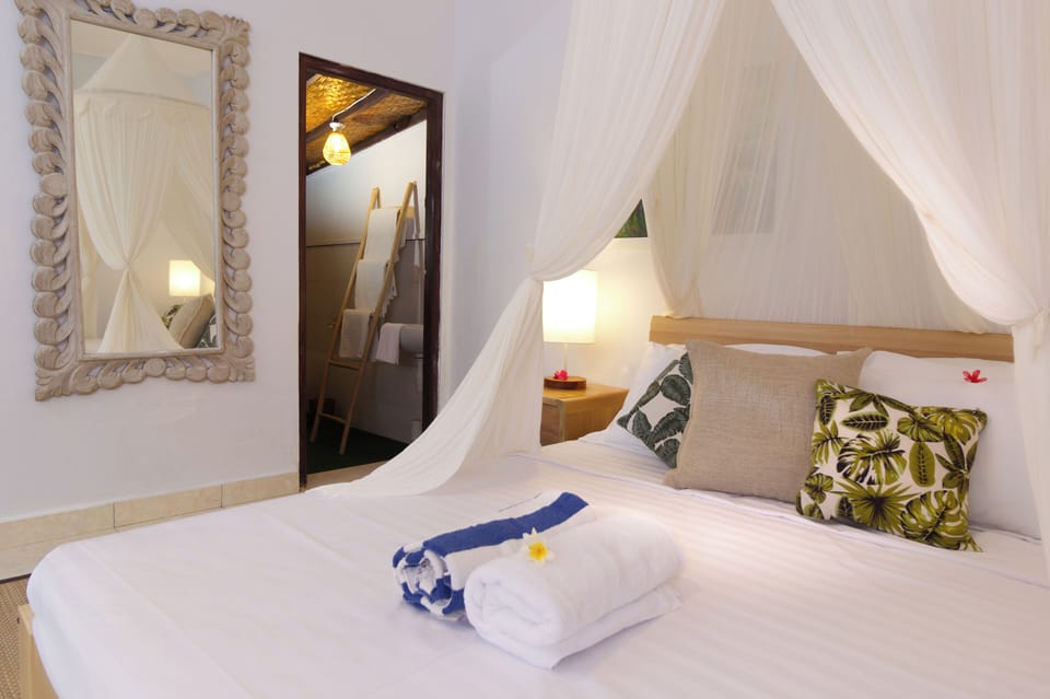 Deluxe Double Room, Pool View | Desk, laptop workspace, free WiFi