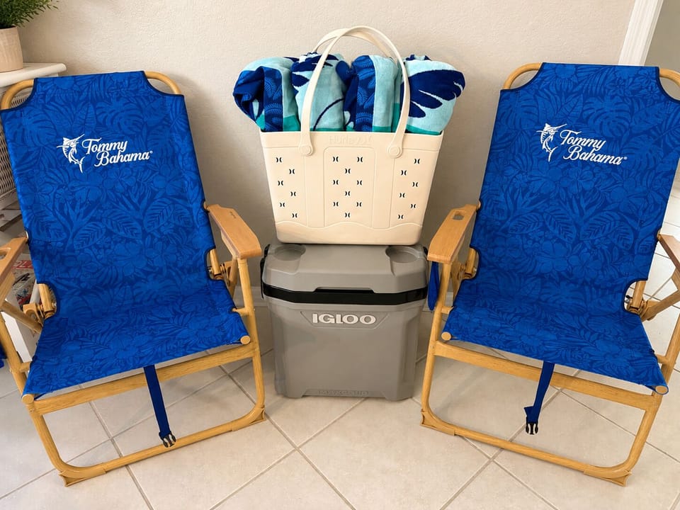 Beach gear included: 2 chairs, cooler, and towels for sunny outings