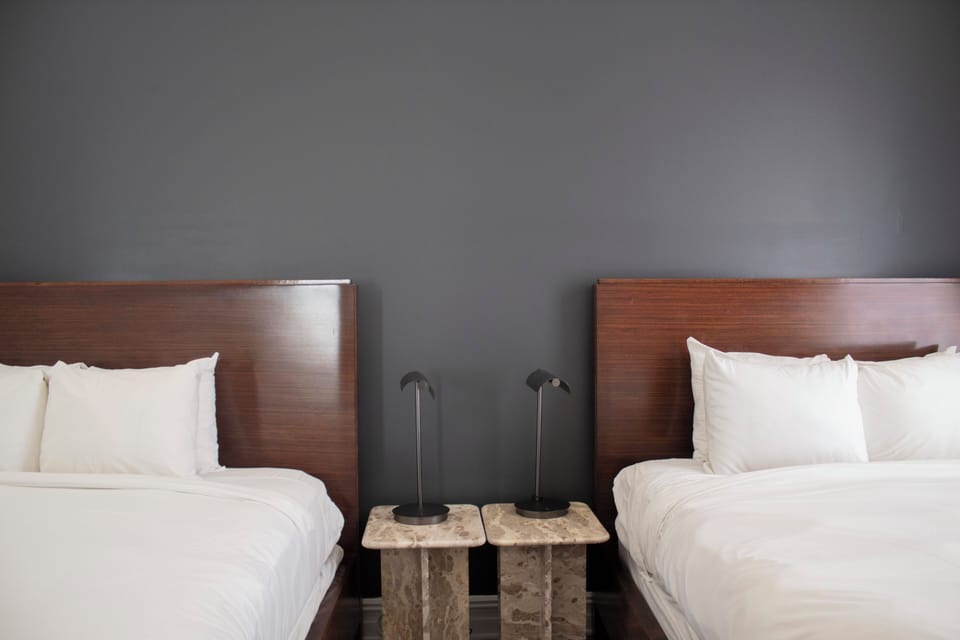 Room, 2 Queen Beds | Desk, cribs (free), WiFi (free), bed sheets