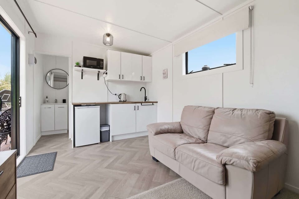 Living and kitchen with herringbone floors