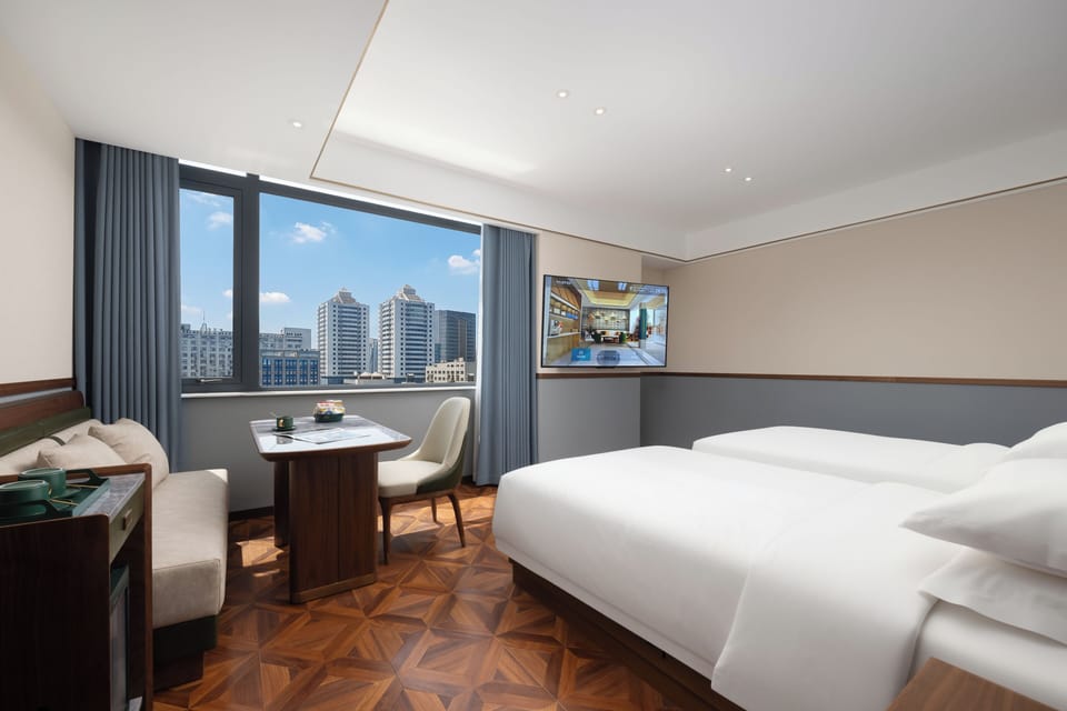 Senior Twin Room | Free minibar, desk, laptop workspace, blackout drapes