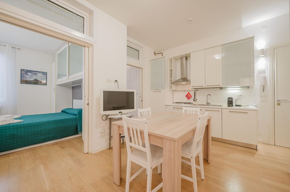 Standard Apartment, Courtyard View | Private kitchen | Fridge, oven, stovetop, espresso maker