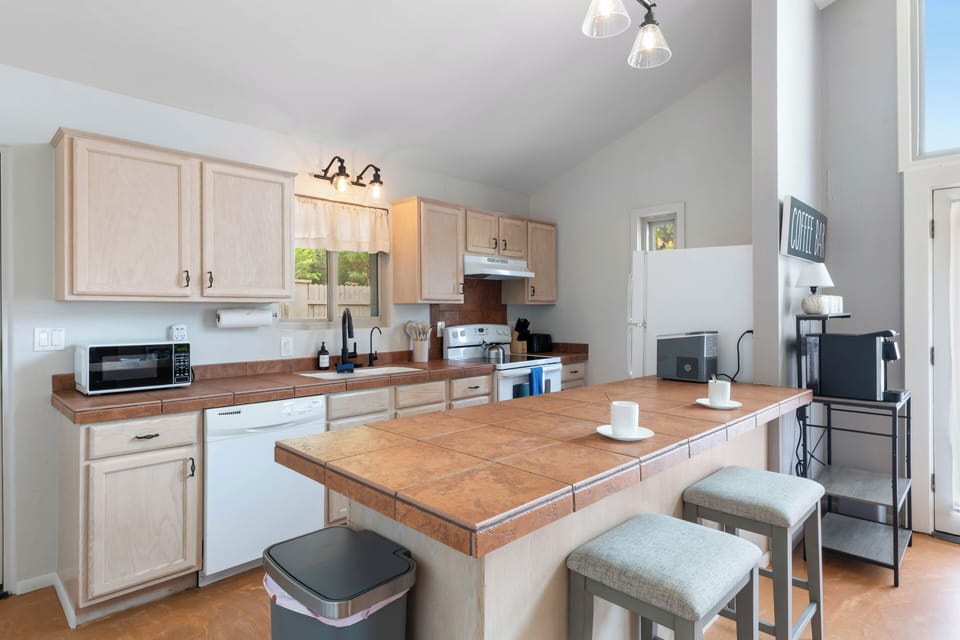Island with counter seating for two.