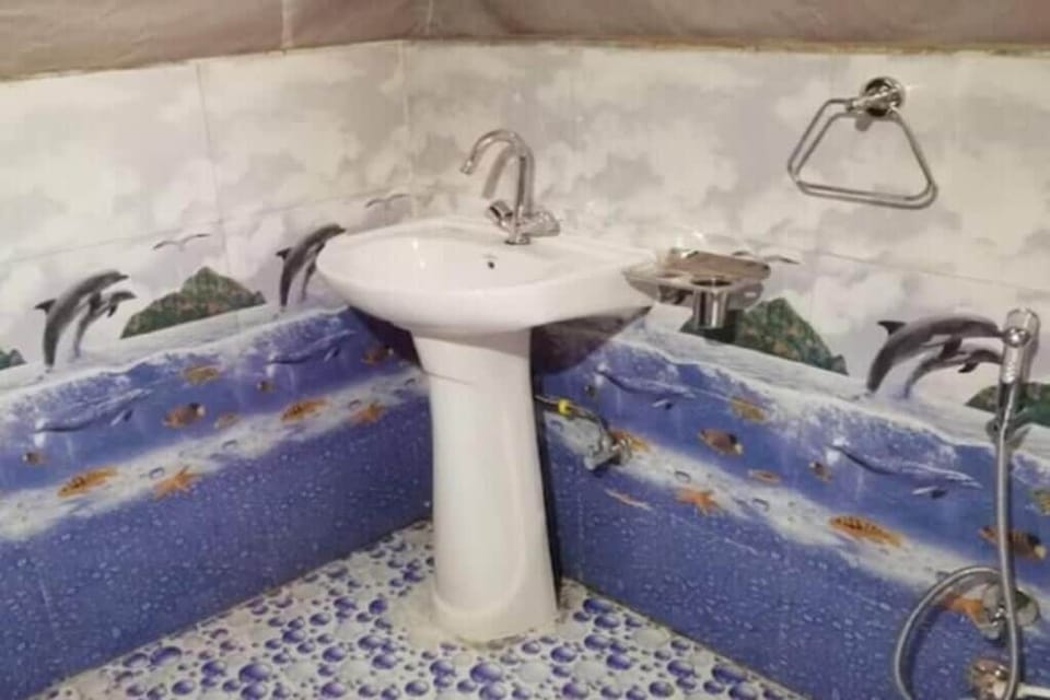 Bathroom | Separate tub and shower, slippers, towels, soap