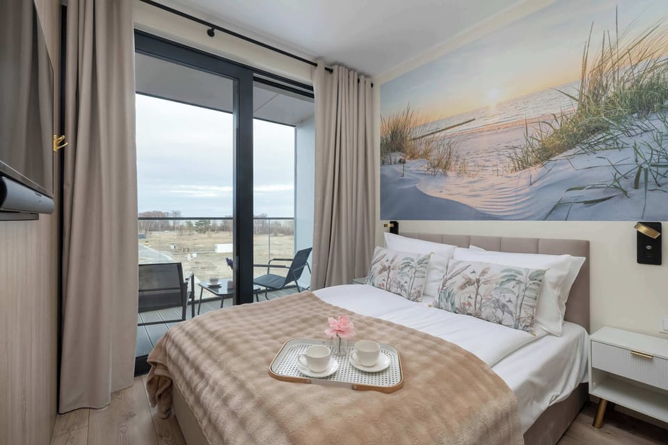 The cosy bedroom features a luxurious double bed.