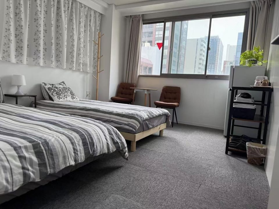 Basic Triple Room, City View | Blackout drapes, iron/ironing board, free WiFi