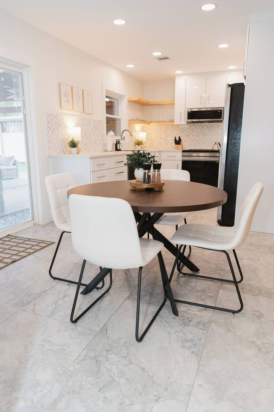 Dining Area: Stylish space for delightful meals and great conversations under warm lighting.