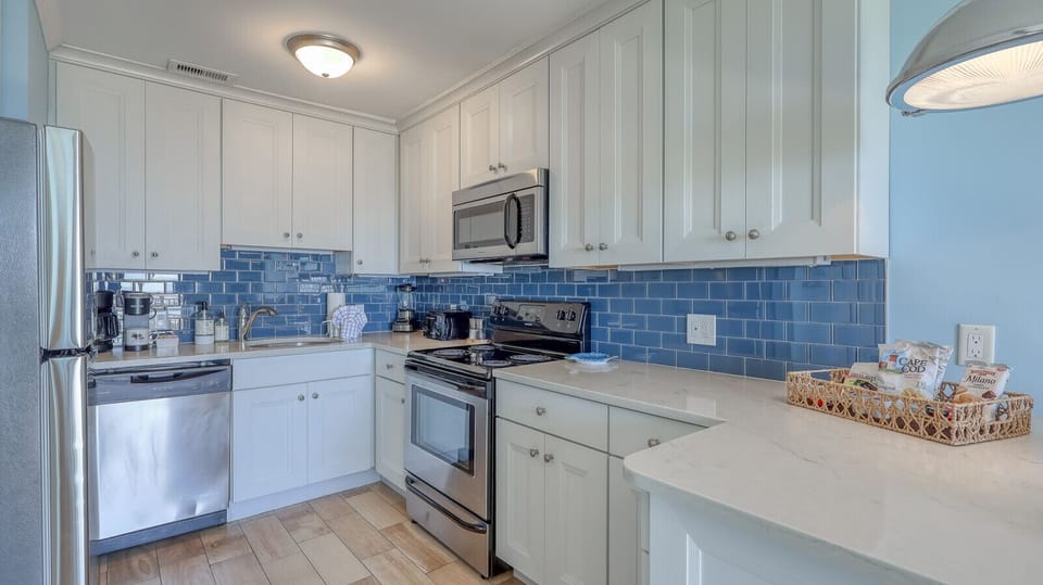 Fully Stocked Kitchen with Dining Bar