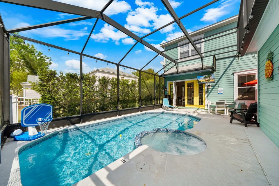 Private screened-in pool and spa—perfect for cooling off or relaxing after the parks
Enjoy your own backyard oasis with space to lounge and unwind under the Florida sun