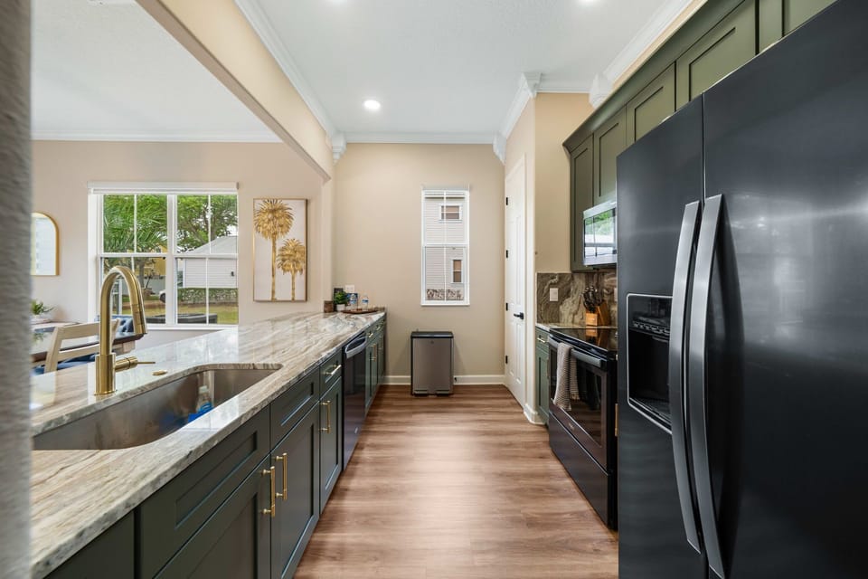 Fully equipped kitchen with modern upgrades and everything you need for home-cooked meals
Clean, open kitchen layout perfect for entertaining and family time
