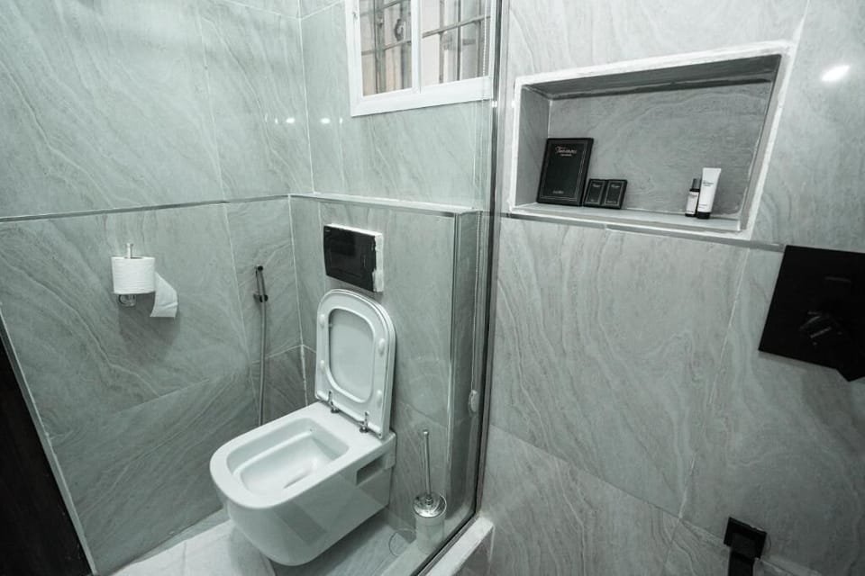 Family Room, Balcony, City View | Bathroom | Free toiletries, hair dryer, bidet, towels