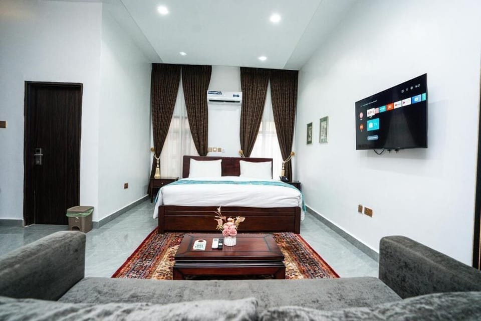 Family Room, Balcony, City View | Desk, laptop workspace, blackout drapes, soundproofing